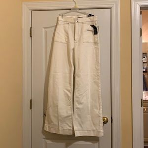 White jeans.Extra flare.Size 11/30.Never been worn